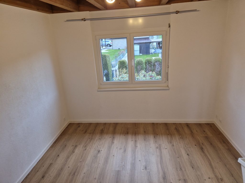 Revêtement vinyle HDF-liège, chambre de villa en région lausannoise